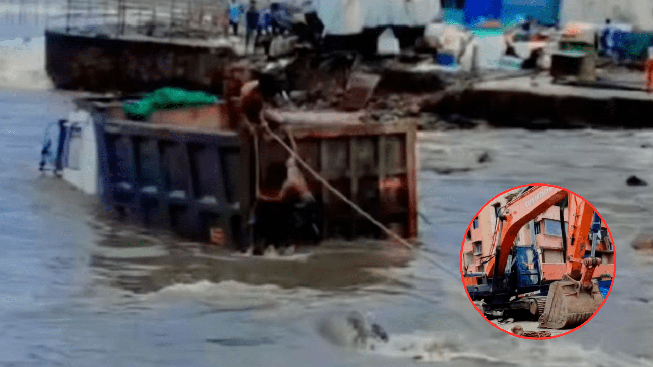 A dumper truck got stuck in the sea water at Uttan Beach.